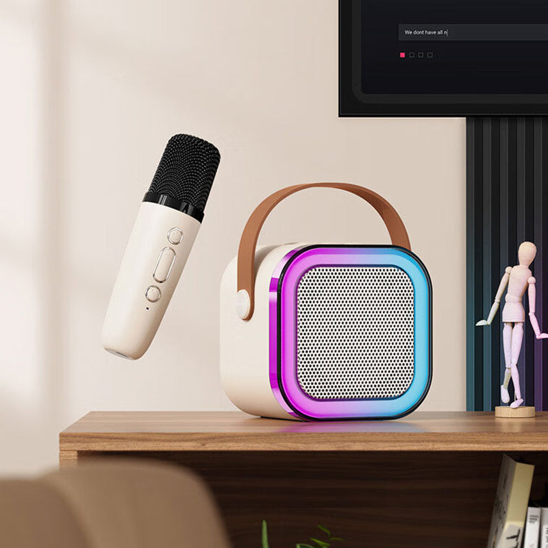 🧸 Mini karaoke machine with wireless microphone